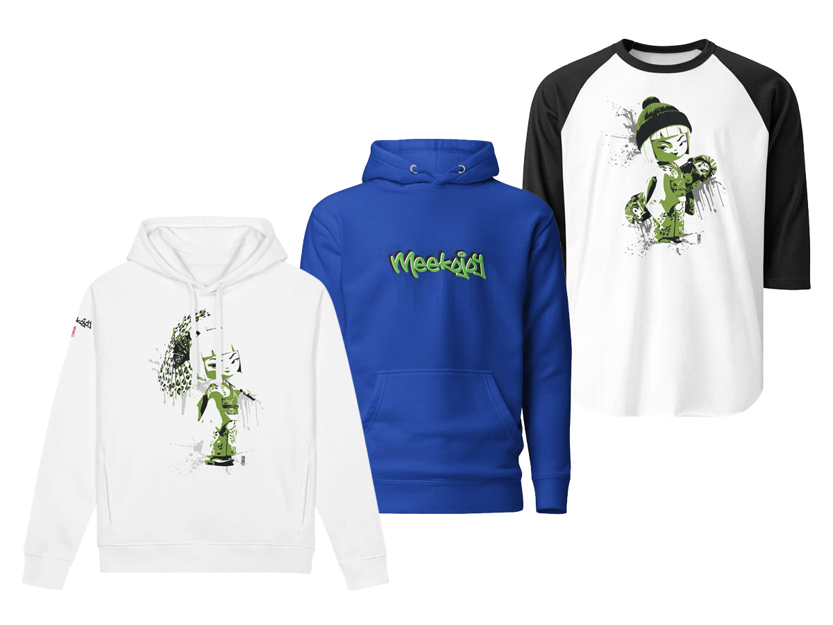 MeekoJoy hoodies and tees laid out together, showing the graffiti wordmark and kokeshi doll graphics